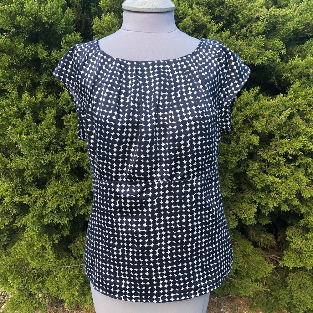 Navy polka dot blouse